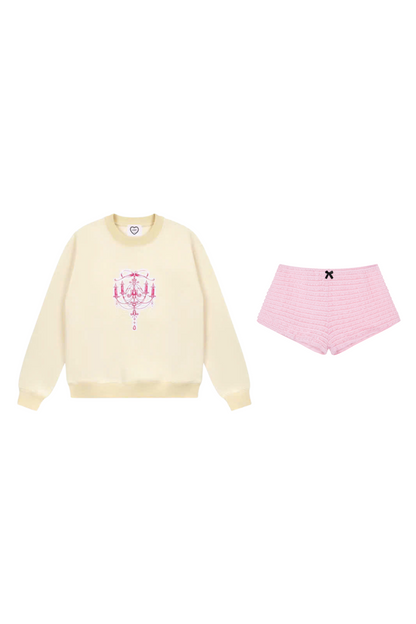 White “Chandelier” sweater + baby shorts